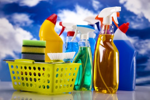 Insured carpet cleaning team working with safety precautions