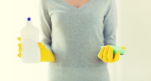 Local cleaners removing construction residue from an Ealing property